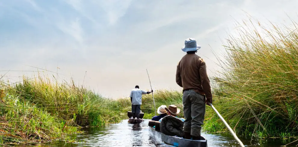 Okavango Delta tradiotnal mokoro experience in Botswana during the day